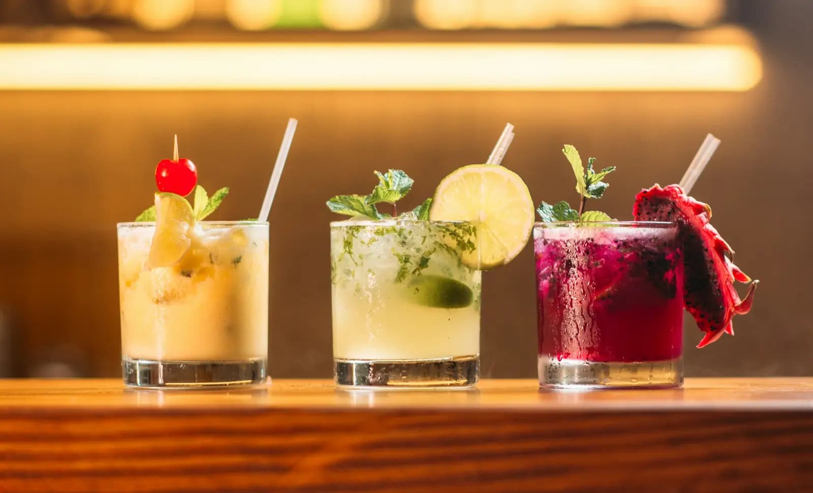 Colourful cocktails prepared at an event bar