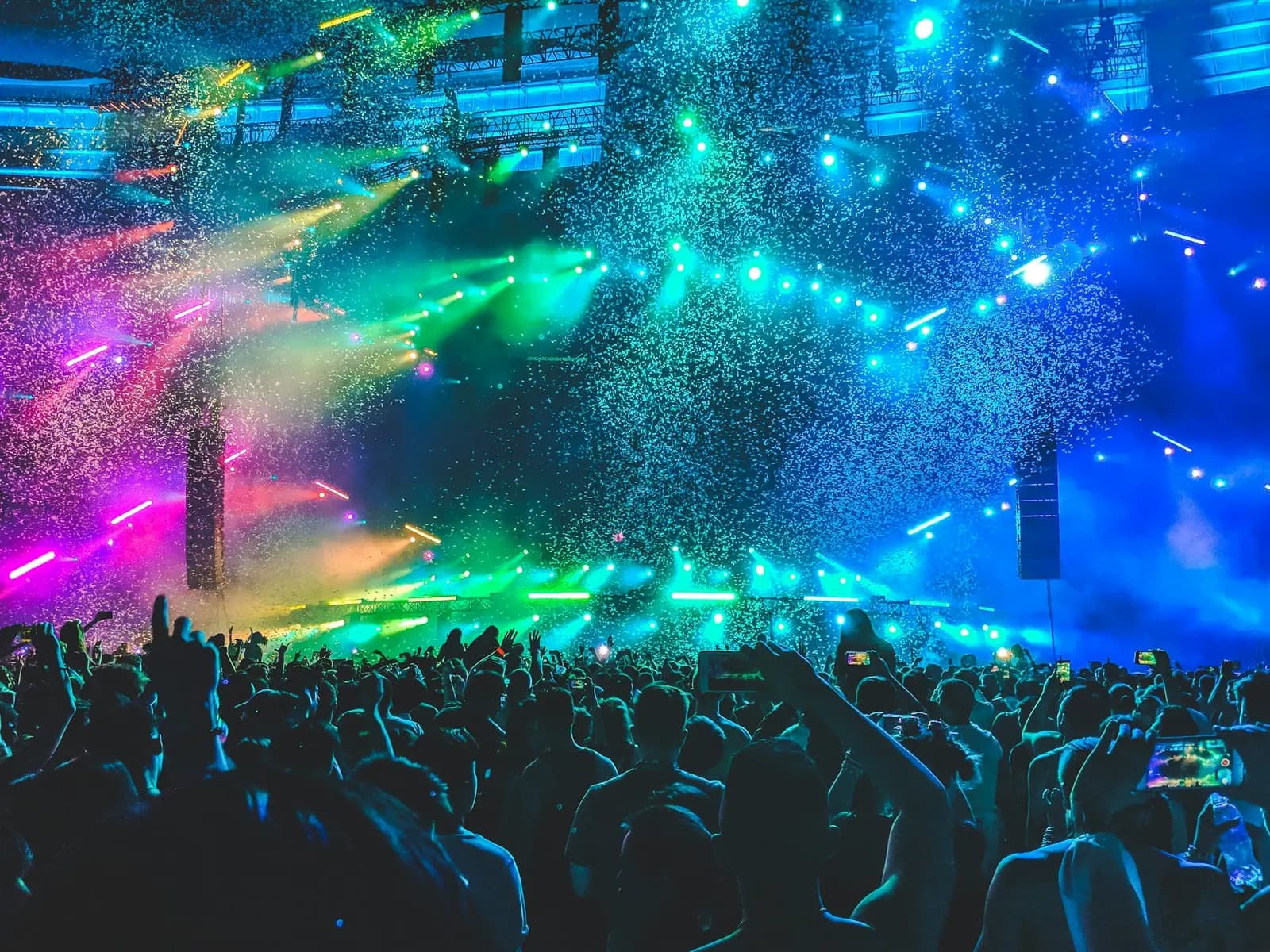 Colourful event lighting across a dance floor