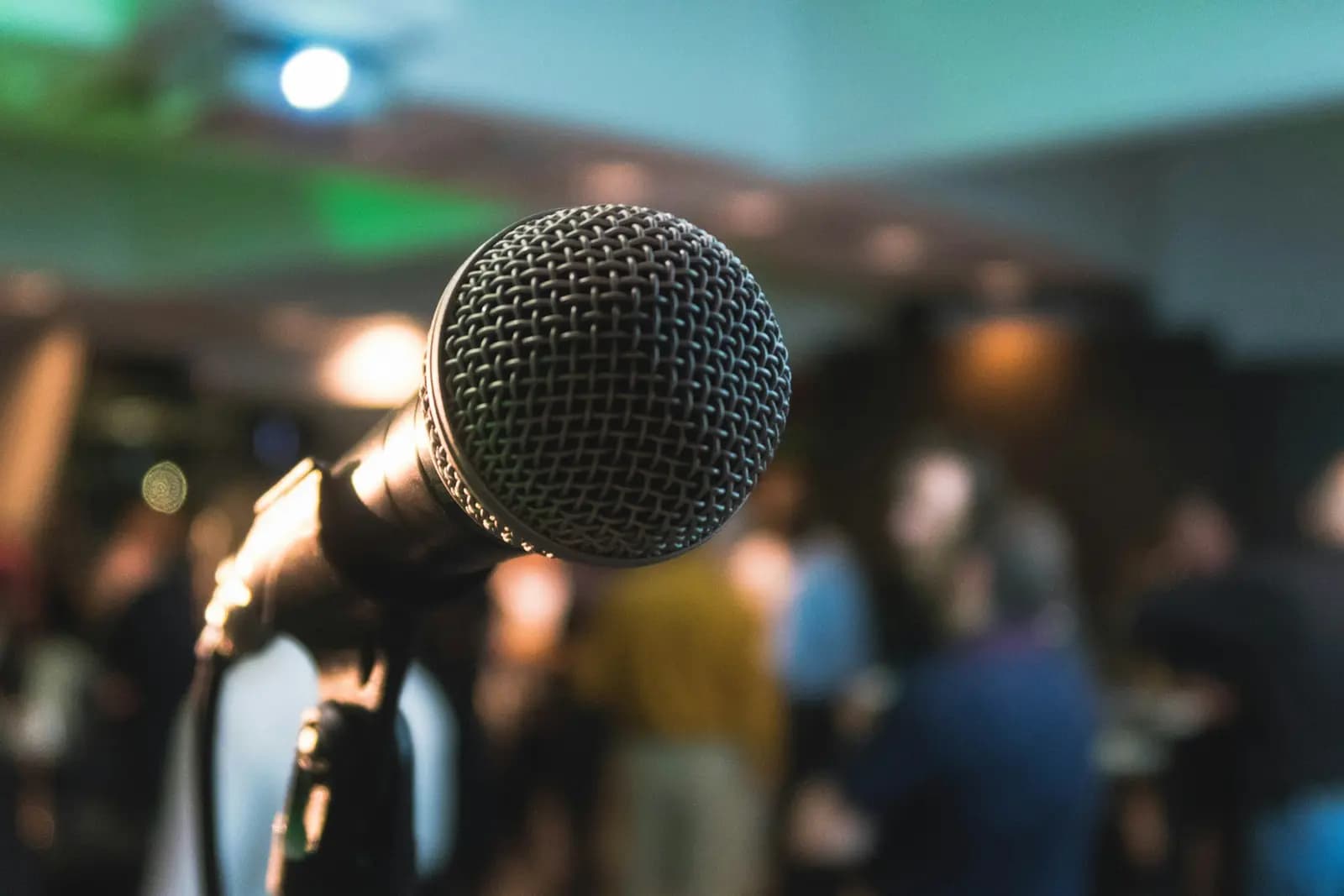 Event host speaking into a microphone