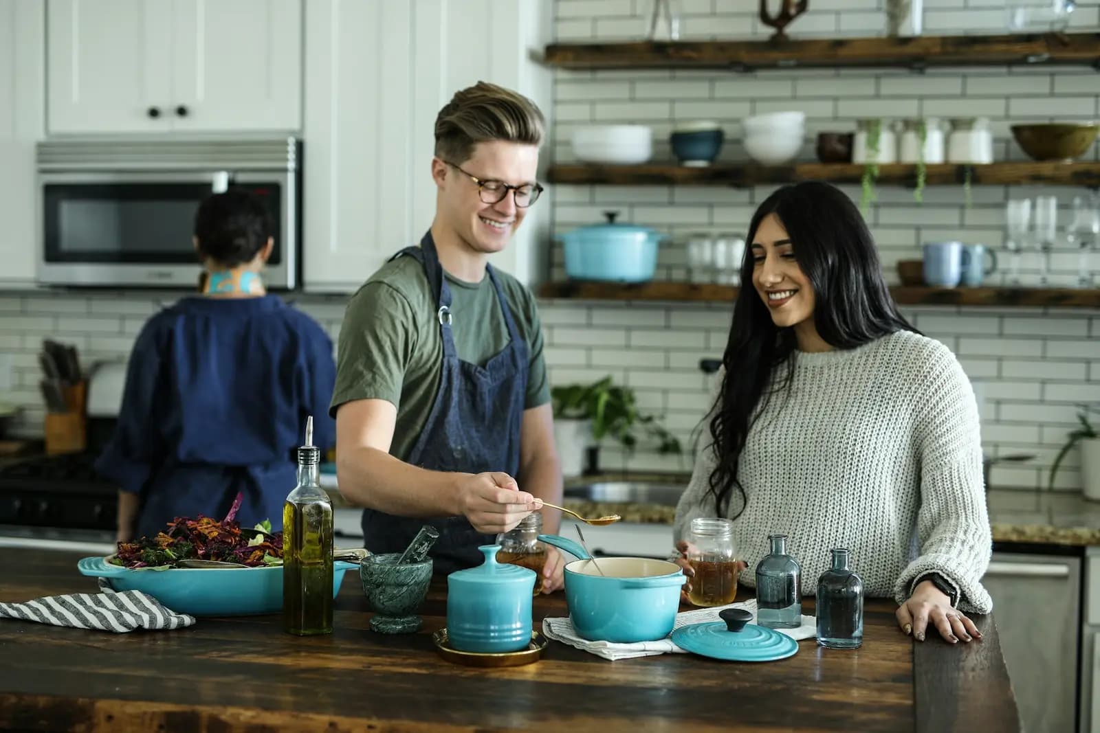 Chefs preparing a meal together in a kitchen